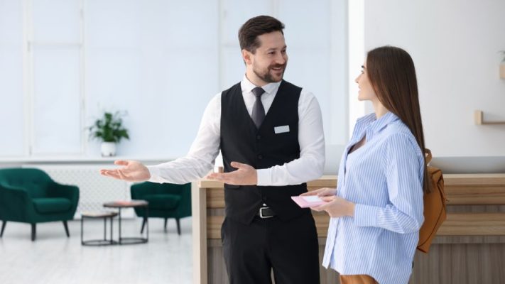 Hotel staff welcoming guests with professional service standards